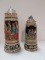 Two West German Stoneware Steins with Music Box Bases