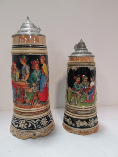 Two West German Stoneware Steins with Music Box Bases