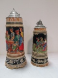 Two West German Stoneware Steins with Music Box Bases