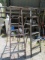 Two Wooden Six Foot Ladders.