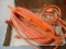 Extra Long Extension Cord on Holder and Twelve Foot Extension Cord.