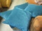 Four Velour Teal Decorative Pillows.