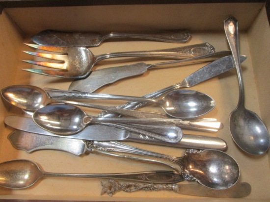 Fourteen Miscellaneous Pieces of Stainless Steel Flatware.
