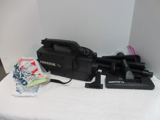 Portable Oreck Xl Vacuum Cleaner with Attachments. Powers On.