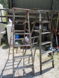 Two Wooden Six Foot Ladders.