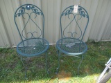Two Wrought Iron Chairs.