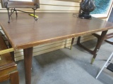 Mid Century Modern Table with Tapered Legs and Brass Caps on End.