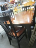 Farmhouse Table with Leaf and Four Chairs Covered Seats. Has a Few Scratches but Good Condition.