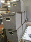 Seven Collapsible Cloth Storage Bins, Light Brown Woven Fabric.
