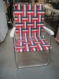 Metal Folding Chair with Red, White, and Blue, Webbing.