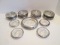 Large Grouping of Sterling Rimmed Crystal Glass Coasters and Bottle Coaster