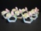 Eight Fine Bone China Napkin Rings with Applied Flowers