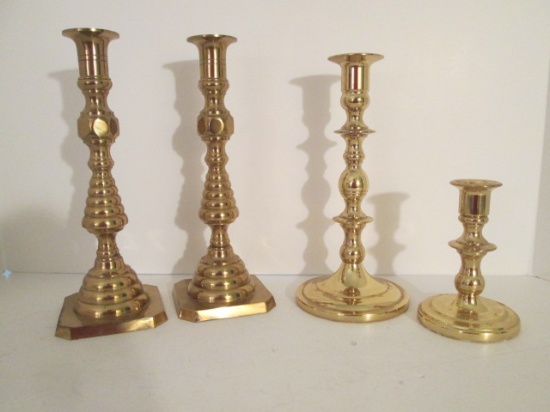 Two Baldwin Brass Candle Sticks and Pair of Brass Candlesticks