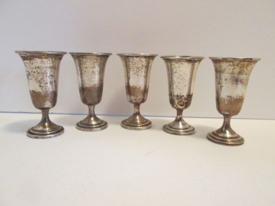 Five Weighted Sterling Cordial Shot Cups