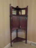 Antique Carved Mahogany Corner Cabinet with Beveled Mirrors