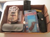 Cabela's 12MP Trail Camera, Remington Shooting Glasses, Black Leather Pistol