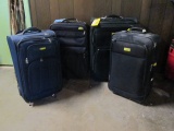 Four Soft Side Rolling Suitcases