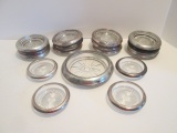 Large Grouping of Sterling Rimmed Crystal Glass Coasters and Bottle Coaster