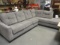 Large Grey Sectional Sofa with  Seven Throw Pillows.