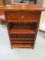 Wine Cabinet with Drawer, Wine Stem Holders, and Twenty Bottle Storage.