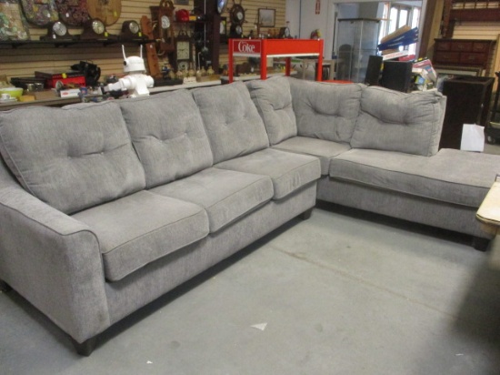 Large Grey Sectional Sofa with  Seven Throw Pillows.