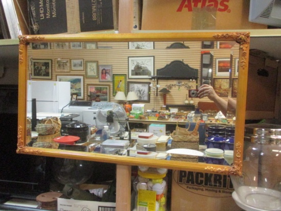 Vintage Brass Colored Beveled Mirror with Flowers on Corners.