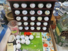 Collection of Golf Balls with Wood Display Shelf, Masters Insulated Cup and