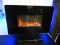 Contemporary Flat Panel Glass Front Faux Fireplace Heater. Has Remote. Very Nice. Working. Has Remot