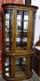 Vintage Lighted Curved Glass Display Cupboard. Mirrored Back With Upper & Lower Center Doors & 4 Gla