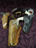 3 Vintage Hubley Cap Guns: Western Revolver With Holster (some Damage); Cowboy Revolver With Holster