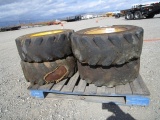 (4) 10-16.5 Solid Tires & Rims,