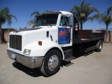 Peterbilt 330 S/A Flatbed Dump Truck,