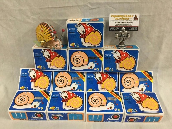 collection of 1970's 12 wind up snail tin toys w/ original boxes Fatigo Wanf Woniv