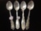 Set of four figural antique sterling silver spoons