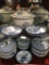 2 shelves full of blue and white asian influenced pieces incl. bowl sets, tureen, etc