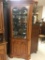 Wonderful rock maple corner curio cabinet with lighted top