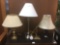 Set of 4 brass, brushed steel and black table lamps - one adjustable