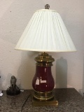 Modern burgundy and gold lamp with elegant design