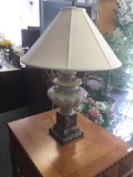 Vintage table lamp with decorative antique inspired look and brass column base