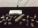 Sterling silver charm bracelet with misc. sterling, silverplate, & pewter charms w/ additional