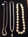 3 strands of faux pearl necklaces, 1 has sterling clasp