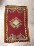 Handwoven Native American/ Southwest design rug in fair cond