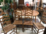 Set of four antique rush bottom ladder back chairs in good condition