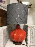 Angular orange mid century inspired lamp with sequined shade