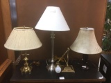 Set of 4 brass, brushed steel and black table lamps - one adjustable