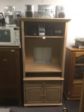 Oak entertainment center with two cd players