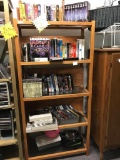 Bookcase with glass shelves full of dvds, VHS &a more - see pics - all one lot!