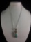 Elegant sterling silver necklace w/ turquoise and feather pendant