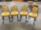 Set of 4 mid century deco cast patio stools with yellow vinyl upholstered seats