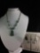 Beautiful sterling silver kokapeli necklace and matching earrings